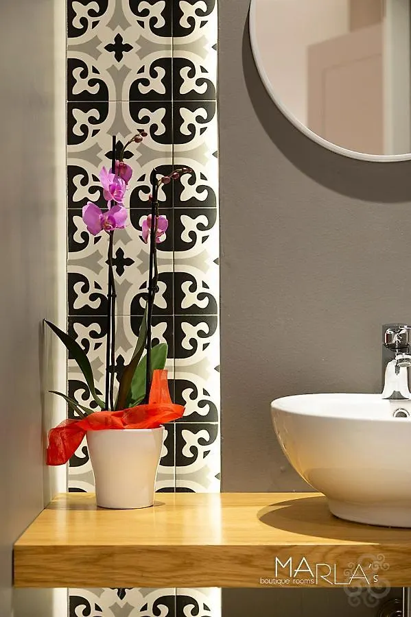 Marla's boutique rooms Noto Couette-café